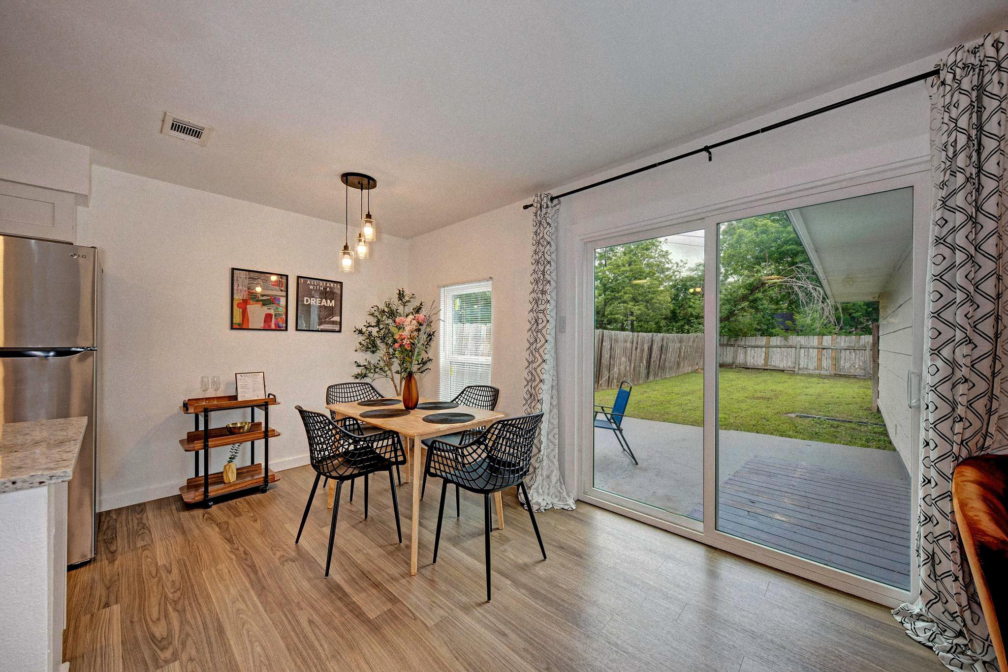 Styled kitchen with warm tones, considered surfaces, and curated objects